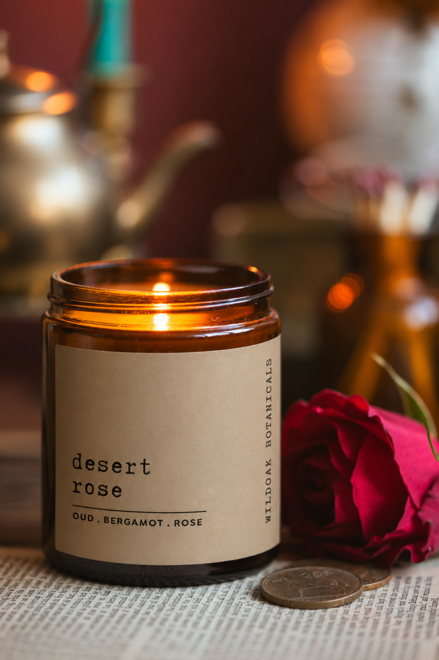 Soy candle titled Desert Rose by COSYPLACE CANDLES featuring warm notes of oud, saffron, and patchouli in a sleek container.