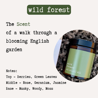 Soy candle from COSYPLACE CANDLE CO. with wild forest scent featuring rose, geranium, and jasmine floral notes.