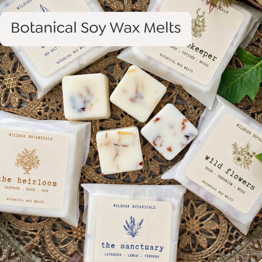 Wildoak Botanicals botanical soy wax melts in a clear container with floral and botanical designs, ready to melt for fragrance.