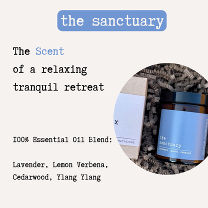 Soy candle from COSYPLACE CANDLES with lavender, lemon, and ylang ylang essential oils, featuring a white container and floral accents.